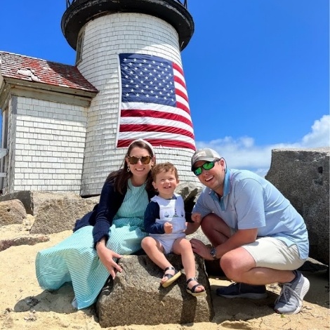 Doctor Anderson with her family at a lighthouse