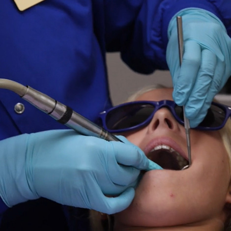 Young child getting a teeth cleaning for kids