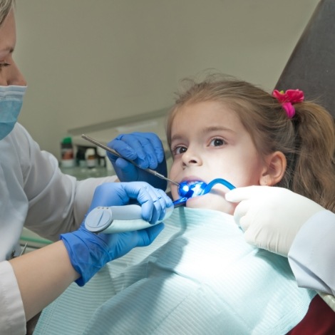 Young girl getting dental sealants