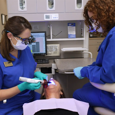 Patient receiving cosmetic dental bonding from Fort Mill cosmetic dentist