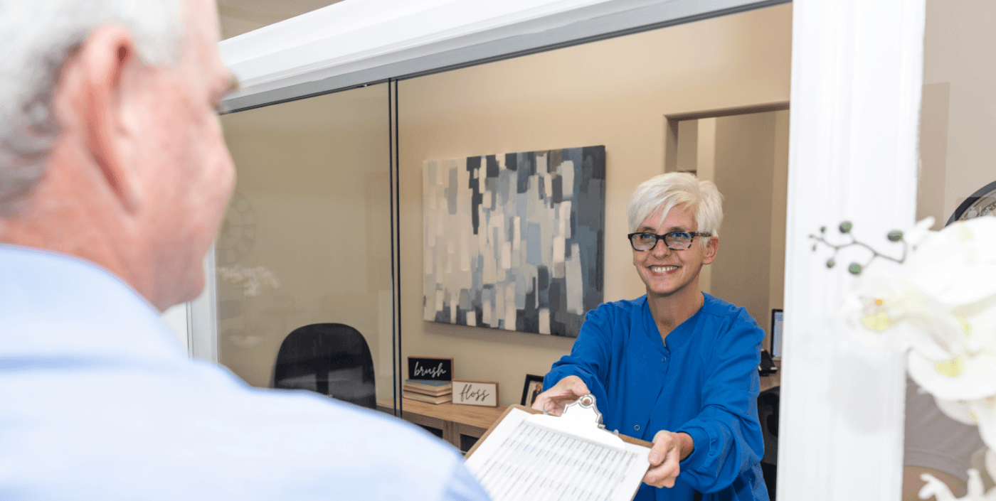 Smiling dental team member