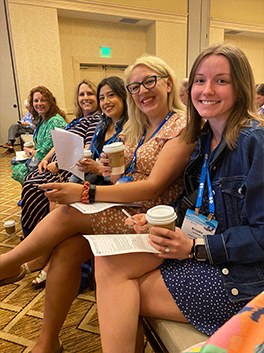 Dental team members at a dental conference