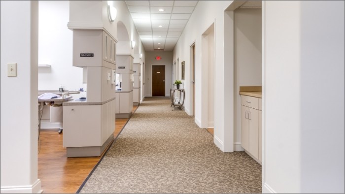 Hallway branching off into dental treatment rooms