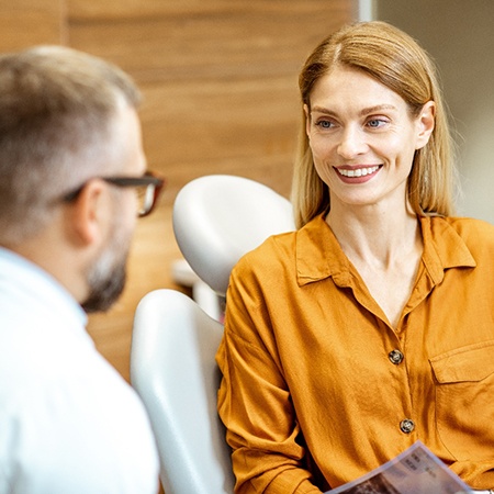 Female patient learning about the cost of teeth whitening in Fort Mill